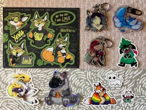 Xenia sticker sheet by Neotheta; 6 stickers: Renamon, a grey protogen, two foxes wrapped in a rainbow flag, autism creature, 2 Undertale/Deltarune characters;
  3 charms: something by Neotheta, a blue/white pooltoy, a female character with red hair and an axe